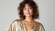 © Larisa AI - A young woman wearing an elegant gold dress poses confidently, showcasing beauty and fashion in a stylish setting, radiating modernity, grace, and self-assurance.