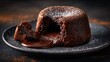 © fivan - Chocolate lava cake centered on dark background, subtle highlight, space for text