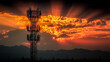 © Benjamin - A telecommunications tower silhouetted against a dramatic sky representing signal distribution, wireless infrastructure, and modern communication systems.