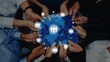 © InfiniteFlow - Hands from diverse individuals hold a blue digital network map, symbolizing global teamwork and collaboration in a modern business landscape, representing unity and progress. Raster