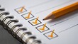© JuliaDorian - Close-up of a checklist with orange pencil marking completed tasks on a spiral notebook, emphasizing organization and productivity in daily planning