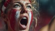 ©  reset bro. - Close-up of a cheering woman with painted face, expression of joy and excitement