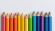 © CreativeArts - diverse set of colorful sharpened pencils in rainbow order symbolizing unity and diversity on white background