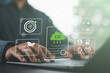 © Nirusmee - Close-up of person using a laptop with net zero and carbon reduction icons, symbolizing CO₂ reduction, recycling, green energy, and sustainable digital innovation.