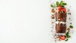 © Hryhor Denys - Healthy plant based chocolate parfait layering rich cream, crunchy nuts, fresh strawberries and mint in a glass on a white table. Vegan treat.