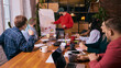 © master1305 - Group of coworkers discussing tasks in modern office. Concept of task coordination, daily workflow and teamwork inside corporate work space.
