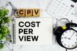 © may1985 - CPV Cost Per View text with calculator and alarm clock on marble background