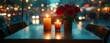 © Pimonpun - Valentine date night at cozy cafe table with candlelight, cinematic warm lighting with bokeh city background