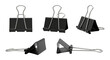 © KHAN - Black binder clips in various positions isolated on a transparent background