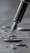 © visoot - Macro shot of fountain pen tip with ink droplet, metallic texture, creative writing concept, close up, detailed, elegant, professional