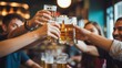 © Proshanto Mondol - Raise a Glass: Cheers to good times and camaraderie as a group of friends clink beer glasses, sharing a moment of joy and celebration.