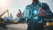 © HAMZA - Man interacting with futuristic construction technology interface