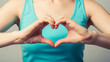 © creative - Woman hands making a heart shape on her stomach, healthy bowel degestion, probiotics for gut health, leaky gut, Sign Language