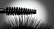© Pixel Stock House - Macro mascara wand applying black mascara to eyelashes, dramatic monochrome beauty closeup