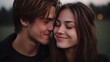 © Bussakon - A young couple shares a tender intimate embrace outdoors during twilight their eyes closed and smiles conveying happiness and deep connection