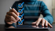 © MDRatul - Digital checklist and task management concept with person using stylus on tablet to check completed business survey or audit.png