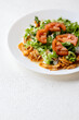 © Sanlad - Close-Up of Chicken Kapsalon with Turkish Doner on White Plate