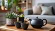 © Oleksandr - A teapot with cups on a wooden tray sits on a coffee table in a modern living room for a relaxing tea time concept