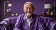 © sevenSkies - purple modern happy on elegant lounge studio background old elderly man portrait fashion style concept photoshoot for banner