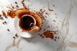 © farah - Coffee splash from a cup and coffee spill on the table from a top view