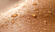 © Bediha Duru Öksüz - Macro shot of glowing human skin covered with water droplets in warm golden light. Ideal beauty and skincare background for hydration, cosmetic products, spa, wellness and summer concepts.