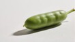 © Robi - Single Green Fava Bean Pod on White Background.