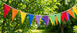 © Dims - Colorful triangular bunting flags hanging in a green garden for outdoor summer festivals and community events
