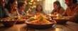 © Pete - Family dines together sharing festive meal. Warm candlelight illuminates dishes of Indian food. People laugh and, enjoying holiday celebration. This scene evokes togetherness and cultural heritage.