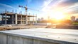© Matthew - A construction site at sunset with cranes and buildings under development, emphasizing progress