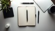 © Akanei - A neatly organized workspace with a notebook and pen, embodying minimalist productivity.