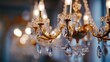 © Laura - Close-up of a luxurious, ornate, crystal chandelier with multiple glowing lights