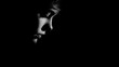 © PACHARA - A woman's face is shown in a black and white photo