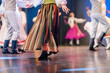 © Raivo - Colorful Latvian folk dance performance showcasing traditional attire and lively movement, capturing the essence of cultural celebration and artistry