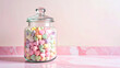 © littlepiccie - Pastel heart shaped sugar candies in jar over pink marble background