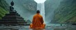 © Maryna - Monk meditates beside Buddha statue near powerful waterfall during rain. Serene orange robed figure sits in lotus pose on wet stone path finding inner peace. Green mountains, cascading water create