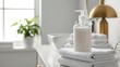 © MindRender - White lotion bottle on stacked towels in bathroom with gold lamp