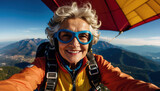 Senior woman smiling on hang gliding adventure
