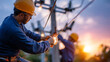 © Laura - Faceless electricians repairing high-voltage power line on utility pole at sunset, safety uniforms, restoring electricity supply, teamwork and reliability, defocused background, wi