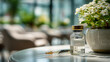 © Maryna - A clear vial with a golden cap sits beside a syringe, both placed elegantly on a table, with a lush plant in the background, creating a serene atmosphere.