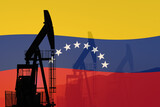 Silhouette of old rig on a background of Venezuela flag. 