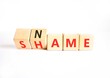 © Dzmitry - Name or shame symbol. Concept words Name or Shame on beautiful wooden cubes. Beautiful white table white background. Business name or shame concept. Copy space