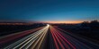 © vxnaghiyev - Night scene of vehicles on a highway at night, emphasizing night driving conditions and traffic flow