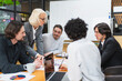 © Юлия Завалишина - Teamwork brainstorm. Coworkers cooperating working together at office meeting. Colleagues discussing project ideas. Group of people in creative office discussing business. Young professional team