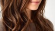 © Maryna - Woman with long brown hair is smiling
