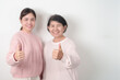 © Jo Panuwat D - Couple woman with pink Shirt for Pink October Breast Cancer Awareness month, May Women Health, women rights, Empowerment, March International Women day, February Valentine, May International Mother