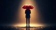 © mdareyan - Silhouette of a person holding a red umbrella under dramatic spotlighting with reflections