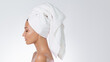 © Buyanskyy Production - Side-Profile Beauty Shot Of Towel-Wrapped Woman On White Background