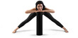 © olegphotor - Mockup of black floor mat, yoga tracksuit, top, leggings on trainer woman, png, front view