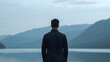 © ATime7Day - Lone man stands before vast serene lake with majestic mountain, embodying quiet power of self confidence. His contemplative gaze suggests thoughtful reflection on tranquil morning