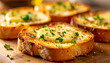 © hardvicore - Freshly baked garlic bread, buttery garlic spread and parsley garnish, bakery-style food. Tasty snack.